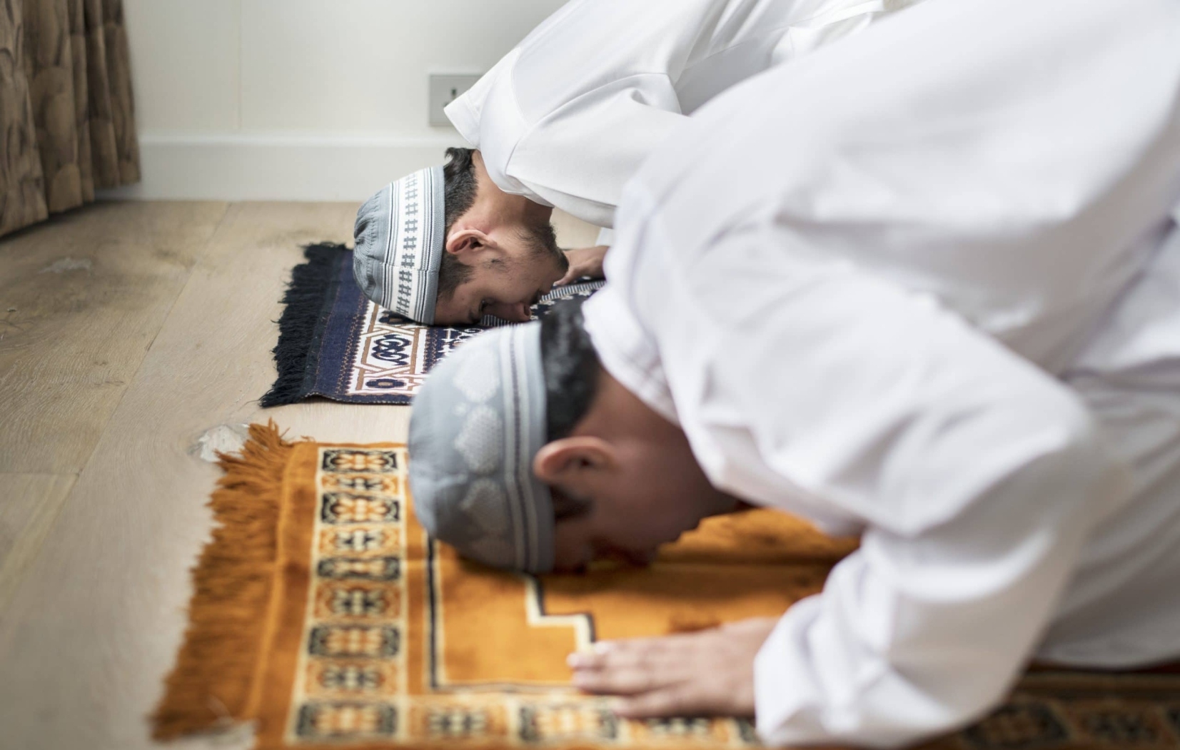 Muslim man praying in mosque